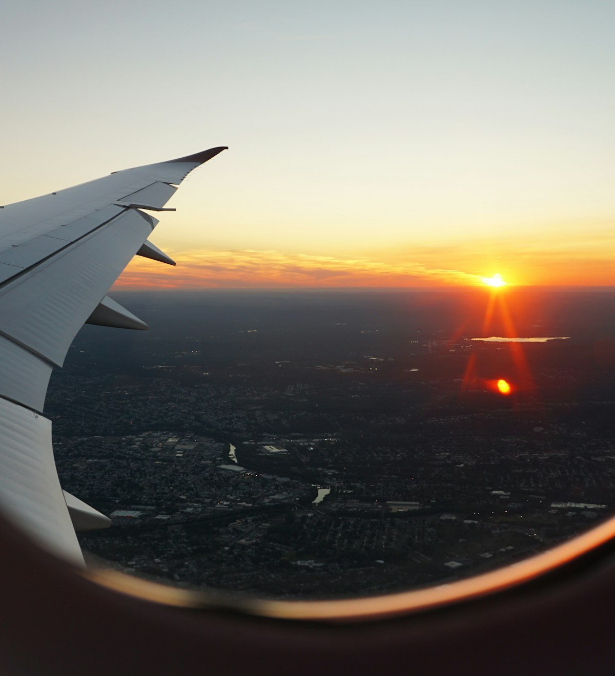 Sunset seen from an airplane window