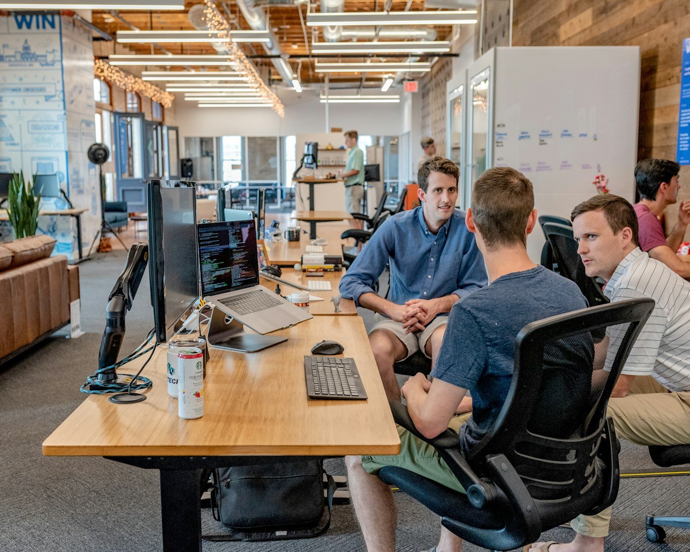 Consultancy team collaborating in a modern office